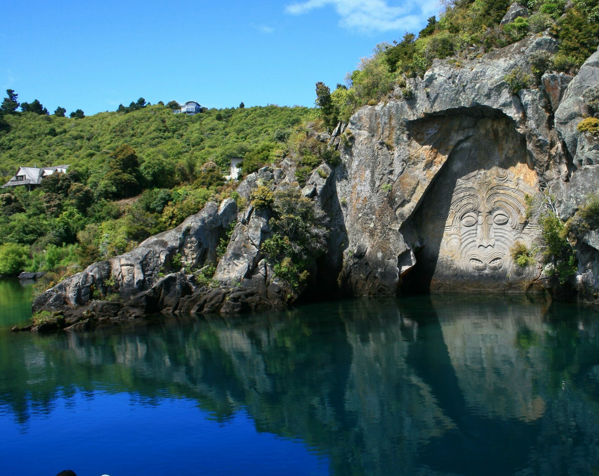 Māori Rock Carving Ngātoroirangi on the edge of Lake Taupo